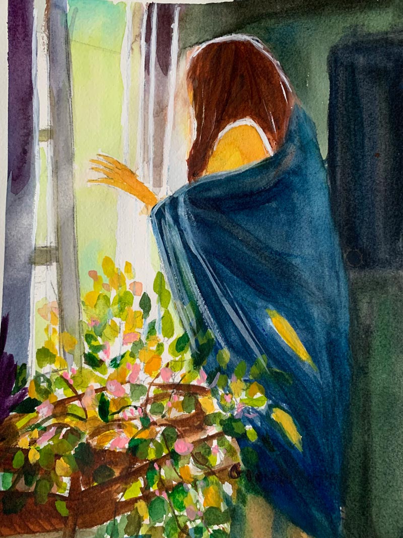 Woman in wrap at window